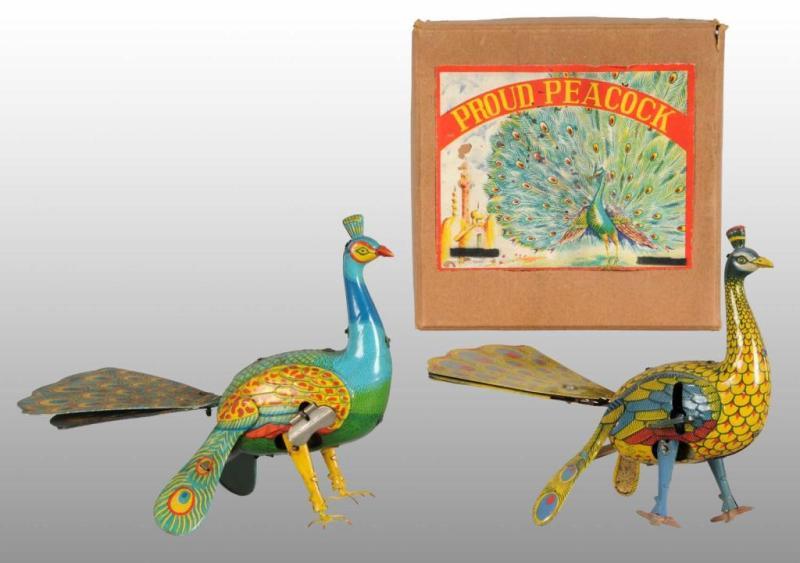 Appraisal: Lot of Tin Peacock Wind-Up Toys Description Japanese Working Includes