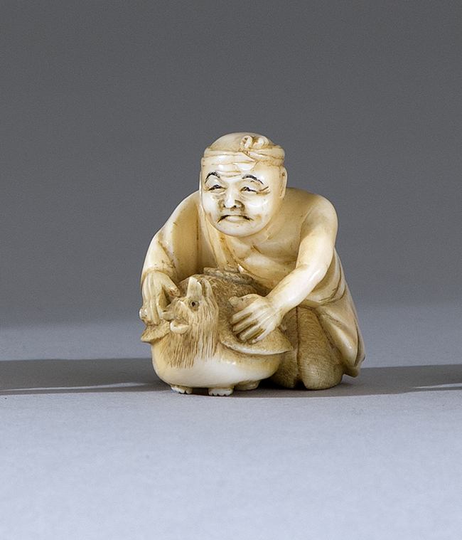 Appraisal: IVORY NETSUKE Early th CenturyBy Minko Depicting a man with