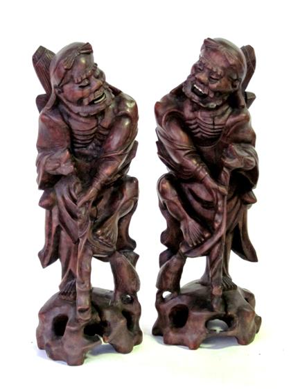 Appraisal: Pair of Chinese hardwood figural carvings early th century