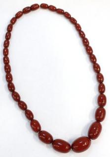 Appraisal: Vintage Bakelite Cherry Amber Beaded Necklace Comprising a string of