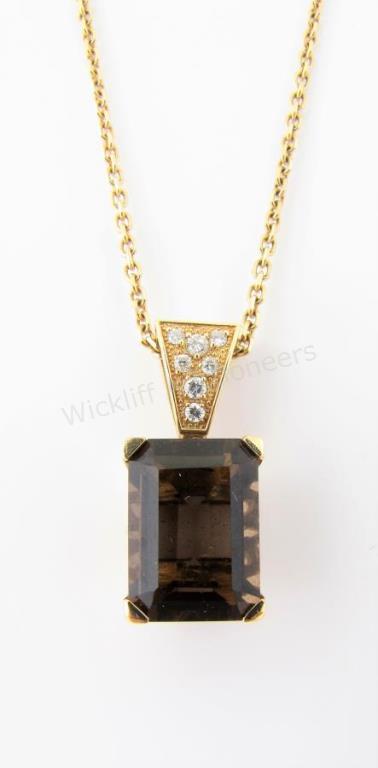 Appraisal: A mm x mm emerald cut smoky quartz pendant with