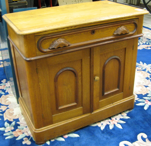 Appraisal: VICTORIAN ASH COMMODE American late th century the front with