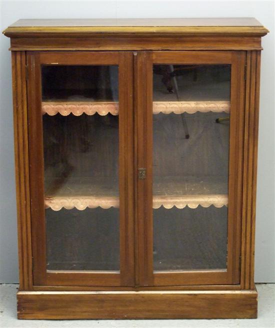 Appraisal: Late Victorian mahogany glazed bookcase on plinth base h w