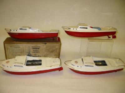 Appraisal: A Commodore cruiser clockwork white deck red hull long -