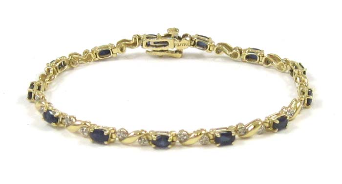 Appraisal: SAPPHIRE DIAMOND AND FOURTEEN KARAT GOLD BRACELET measuring - inches