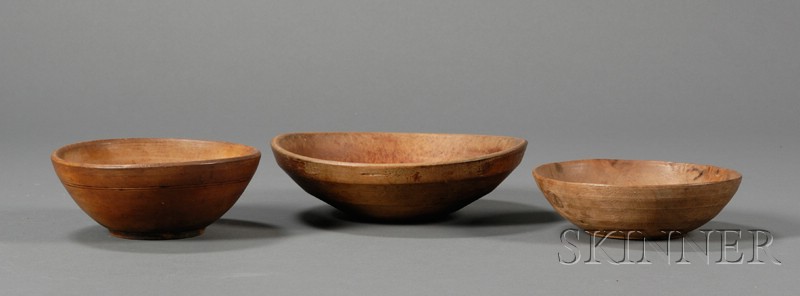 Appraisal: Three Turned Wooden Bowls America th century ht dia in