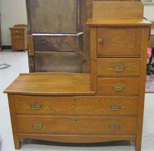 Appraisal: AN OAK DRESSER NIGHTSTAND AND WALL MIRROR GROUP American c