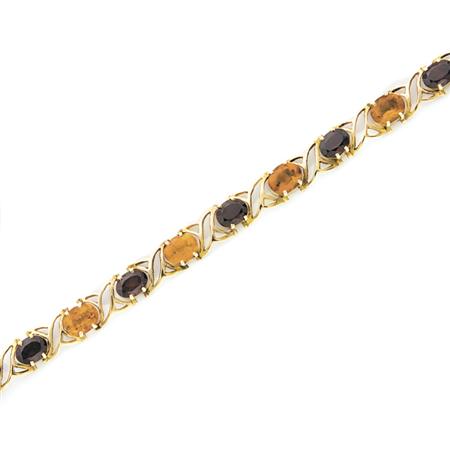 Appraisal: Gold Garnet and Citrine Bracelet Estimate -