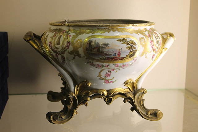 Appraisal: A TH CENTURY CONTINENTAL CERAMIC PLANTER with gilded and painted