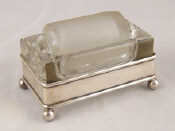 Appraisal: A sterling silver mounted glass stamp wetter of rectangular form