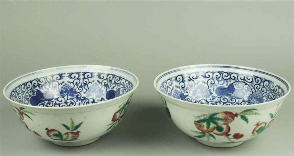 Appraisal: PAIR OF CHINESE FAMILLE ROSE AND UNDERGLAZE BLUE ROUNDED BOWLS