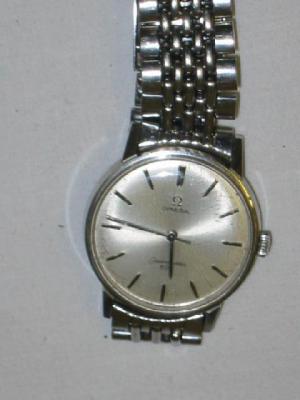 Appraisal: AN OMEGA SEAMASTER WATCH with silvered dial and number battons