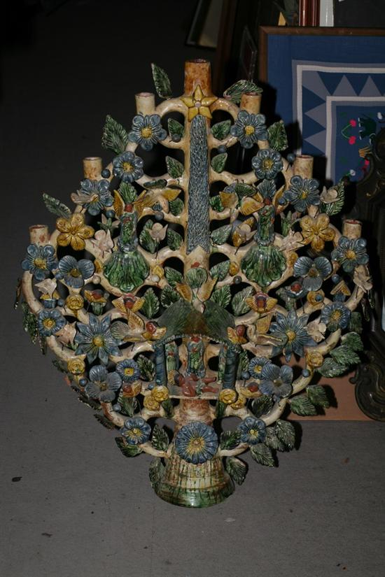 Appraisal: MEXICAN POLYCHROME-GLAZED TERRACOTTA TREE OF LIFE CANDELABRA Centered with nativity