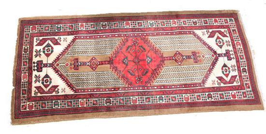 Appraisal: CONTEMPORARY HAND KNOTTED PERSIAN TRIBAL RUNNER Geometric medallion central field