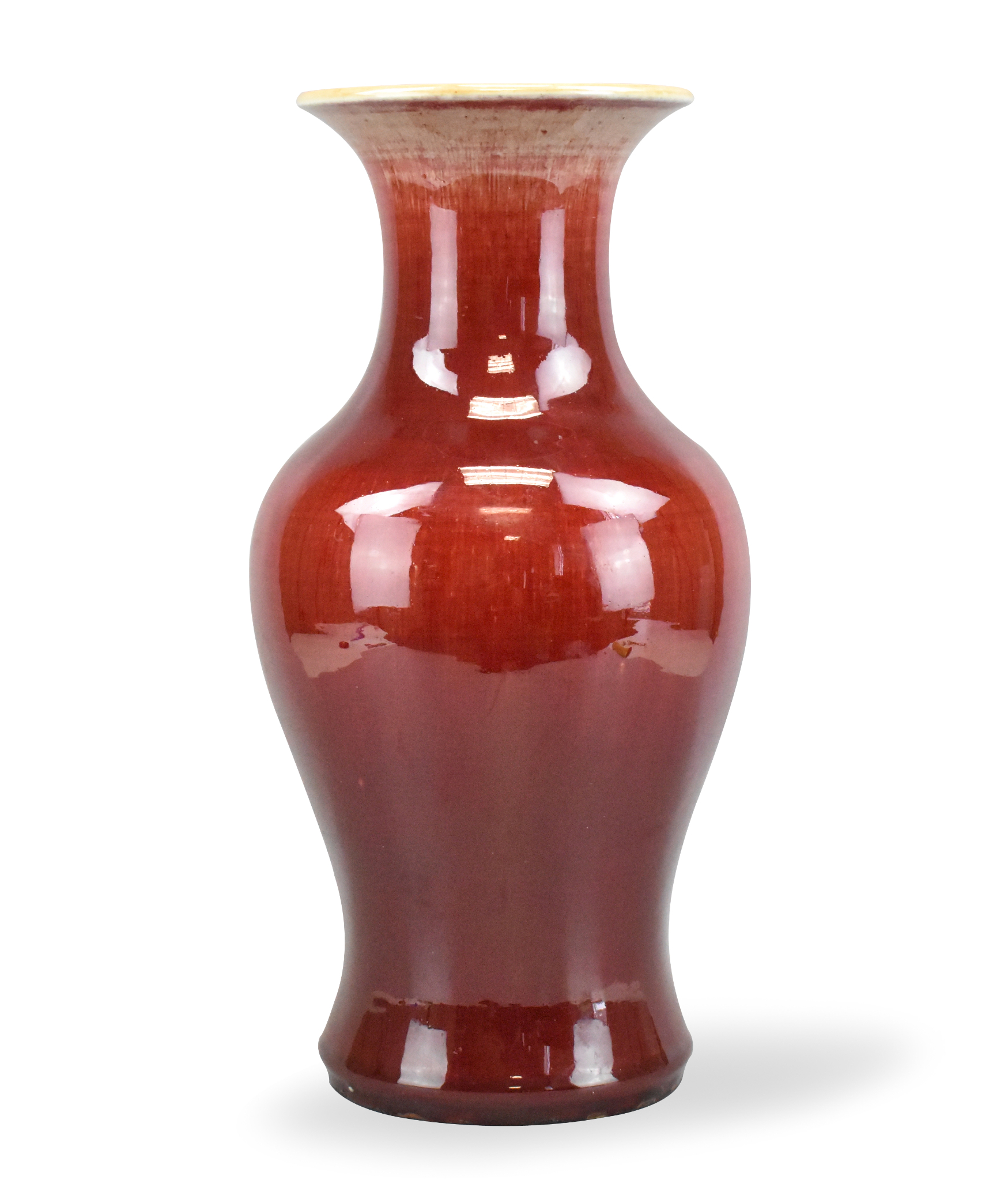 Appraisal: A Chinese red glazed guanyin vase dating from the th