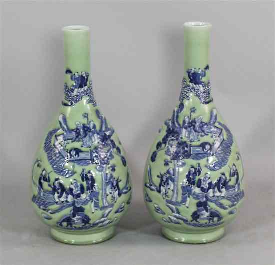 Appraisal: A pair of large Chinese celadon glazed bottle vases each