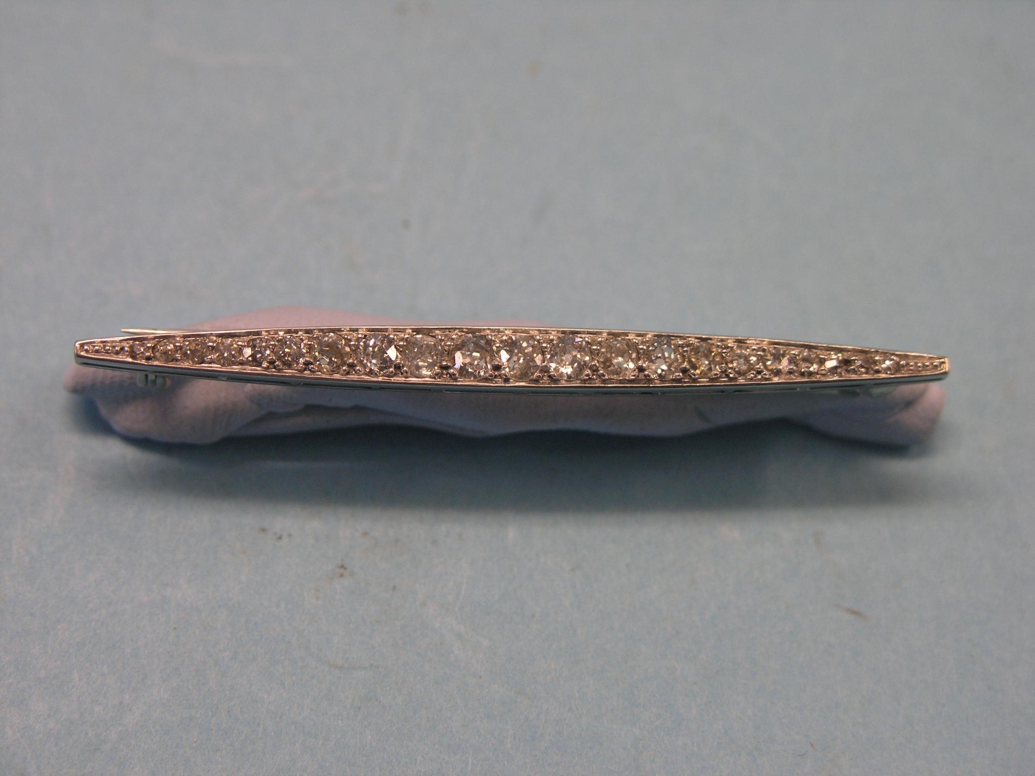 Appraisal: A white metal and diamond bar brooch small graduated diamonds