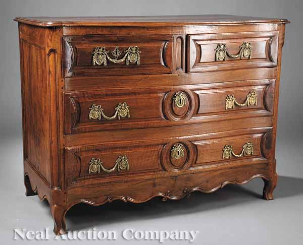 Appraisal: A Large Louis XV Provincial Carved Walnut Commode mid- th