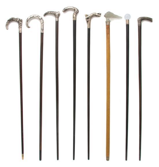 Appraisal: Group of Eight Glass and Silver Handled Canes comprised of