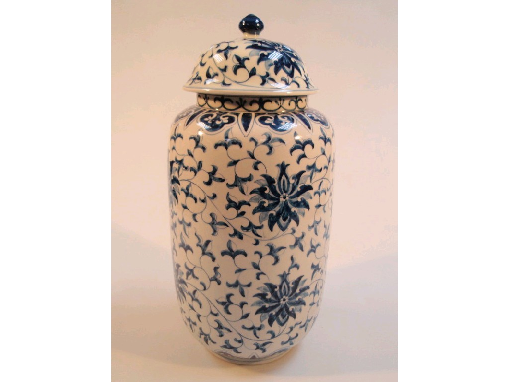 Appraisal: A Chinese vase and cover painted in blue with lotus