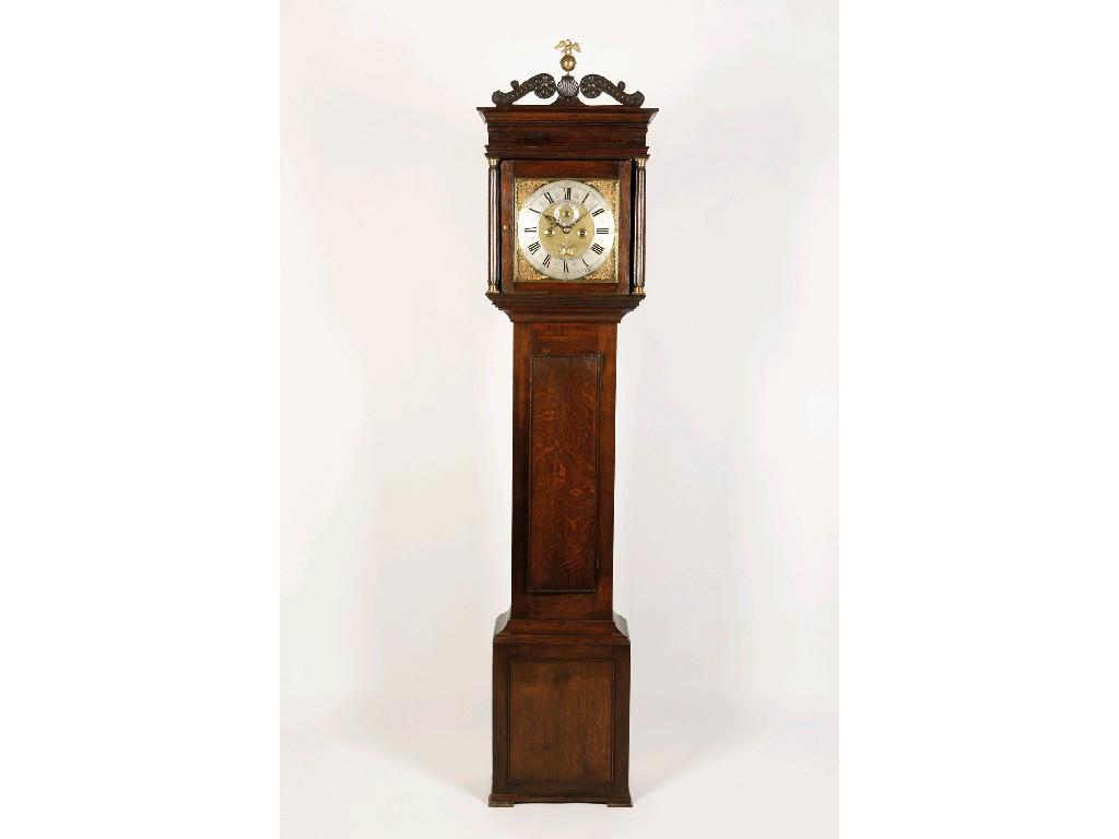 Appraisal: A GEORGE III OAK LONGCASE CLOCK the silvered chapter ring