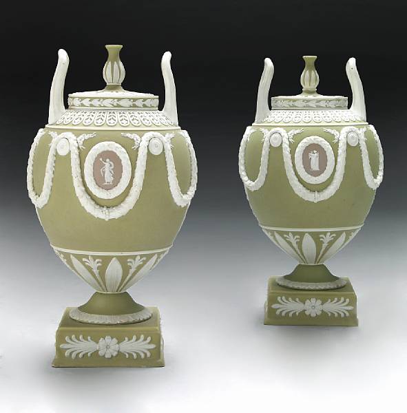 Appraisal: A pair of Wedgwood three color jasperware covered urns th