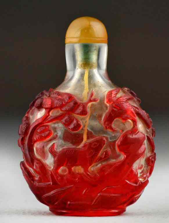 Appraisal: Chinese Qing Peking Glass Snuff BottleRed overlay glass on a