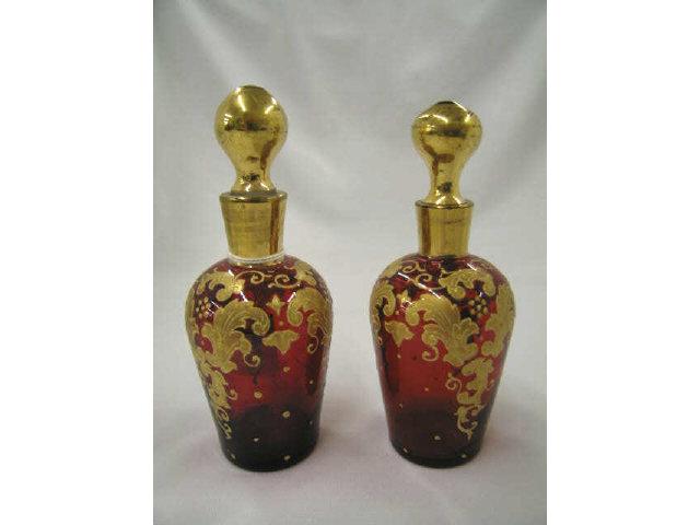 Appraisal: Pair of Bohemian Art Glass Perfumes enameled gold on deep