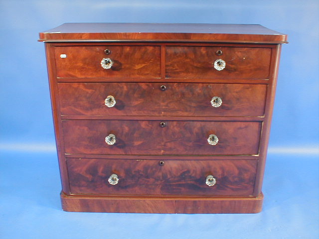 Appraisal: A Victorian flamed mahogany chest of five drawers with glass