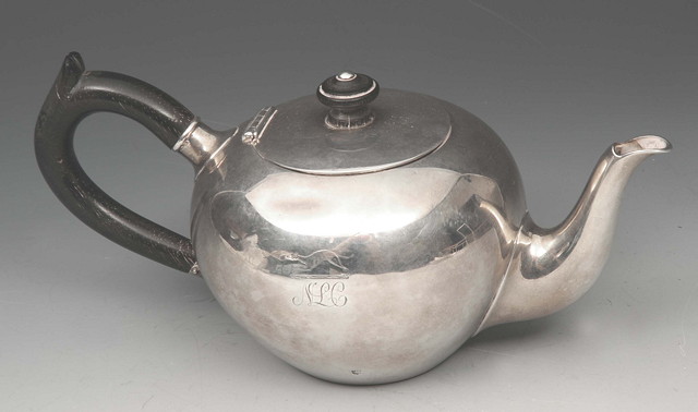 Appraisal: A CONTINENTAL SILVER BACHELORS BULLET SHAPED TEA POT with turned