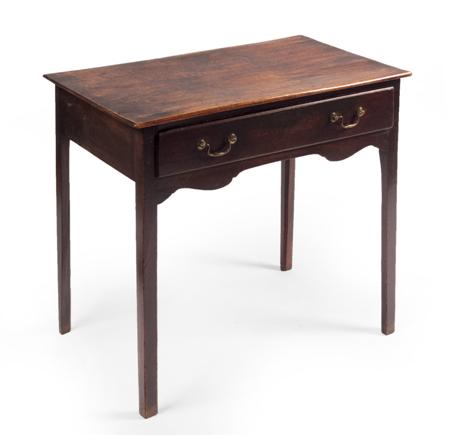 Appraisal: A Georgian mahogany side table the rectangular top over a