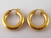 Appraisal: A pair of carat gold hoop earrings approx cm diameter