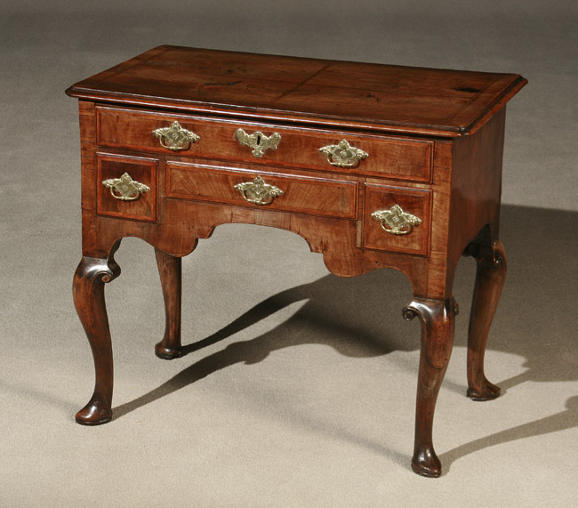 Appraisal: George II Crossbanded and Feather Inlaid Walnut Dressing Table Circa