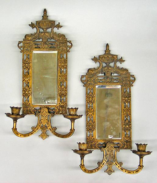 Appraisal: A pair of Renaissance Revival cast brass and mirrored two