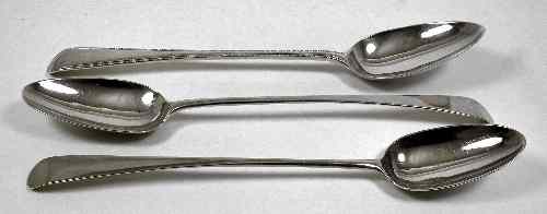 Appraisal: Two George III silver Old English pattern gravy spoons London