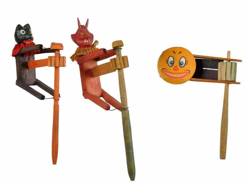 Appraisal: Lot of Wooden Halloween Noisemakers Description Includes devil pumpkin and