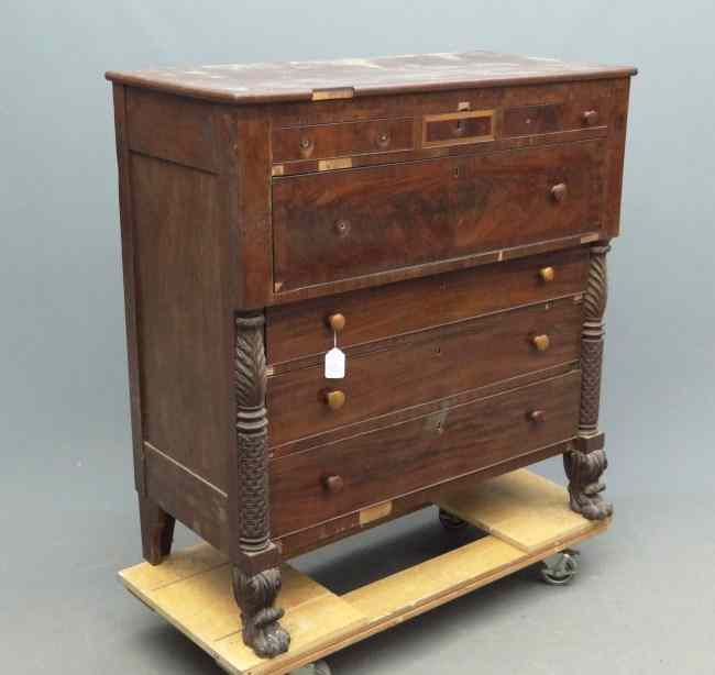 Appraisal: th c Empire dresser with carved columns and hairy paw