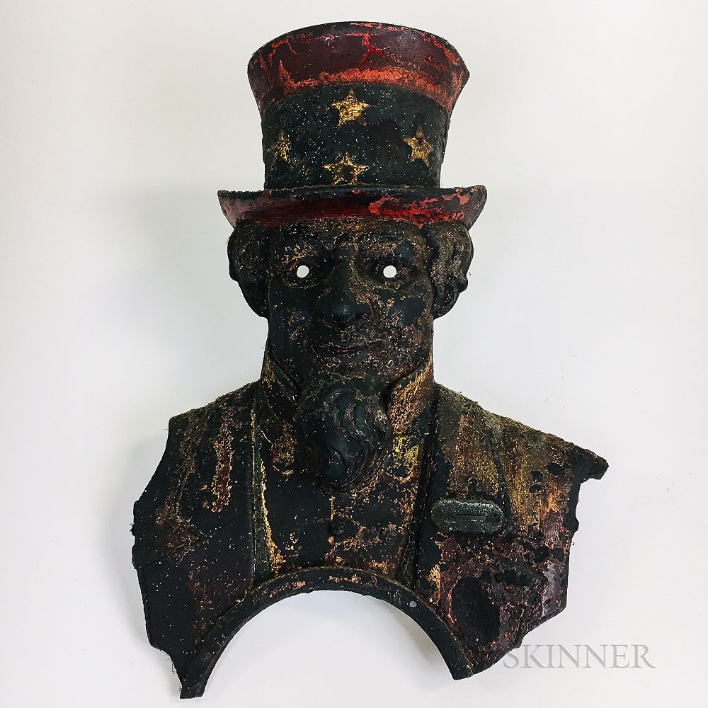 Appraisal: Polychrome Cast Iron Facade of a Coin-operated Uncle Sam Polychrome