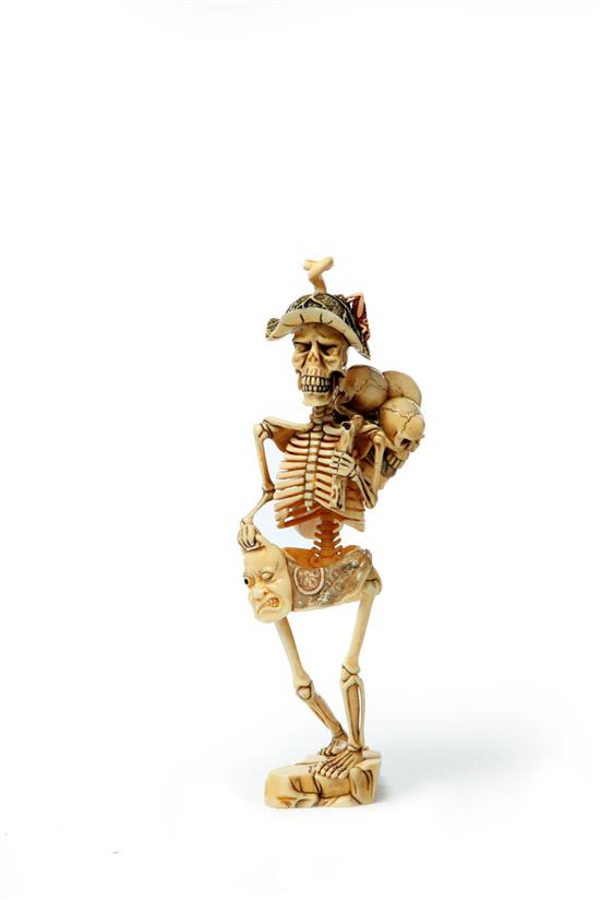 Appraisal: IVORY CARVING OF A SKELETON Japan st half- th century