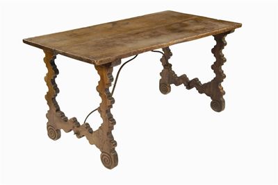 Appraisal: An th century Spanish walnut centre table the twin plank