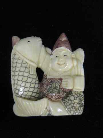 Appraisal: Carved Ivory Netsuke of Man Huge Fish fancy polychrome ''