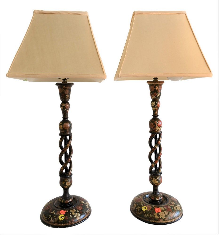 Appraisal: A Pair of Carved Wood Candlestick Lamps having floral decoupage