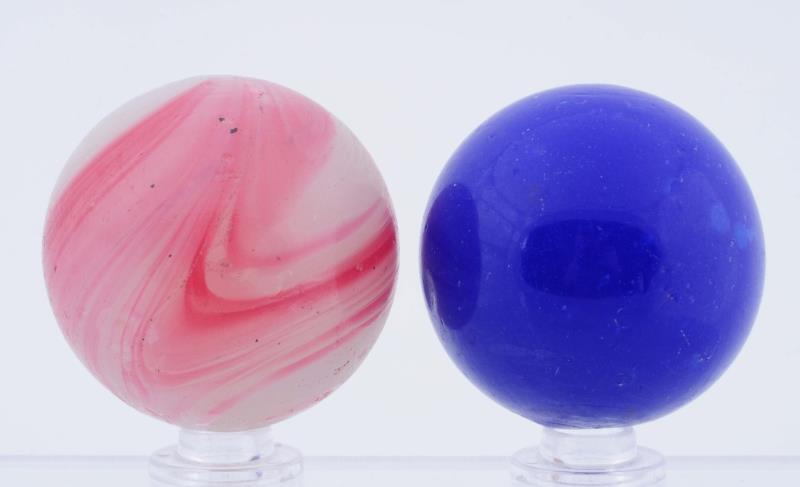 Appraisal: Lot Of Large Opaque Marbles The smaller is a very