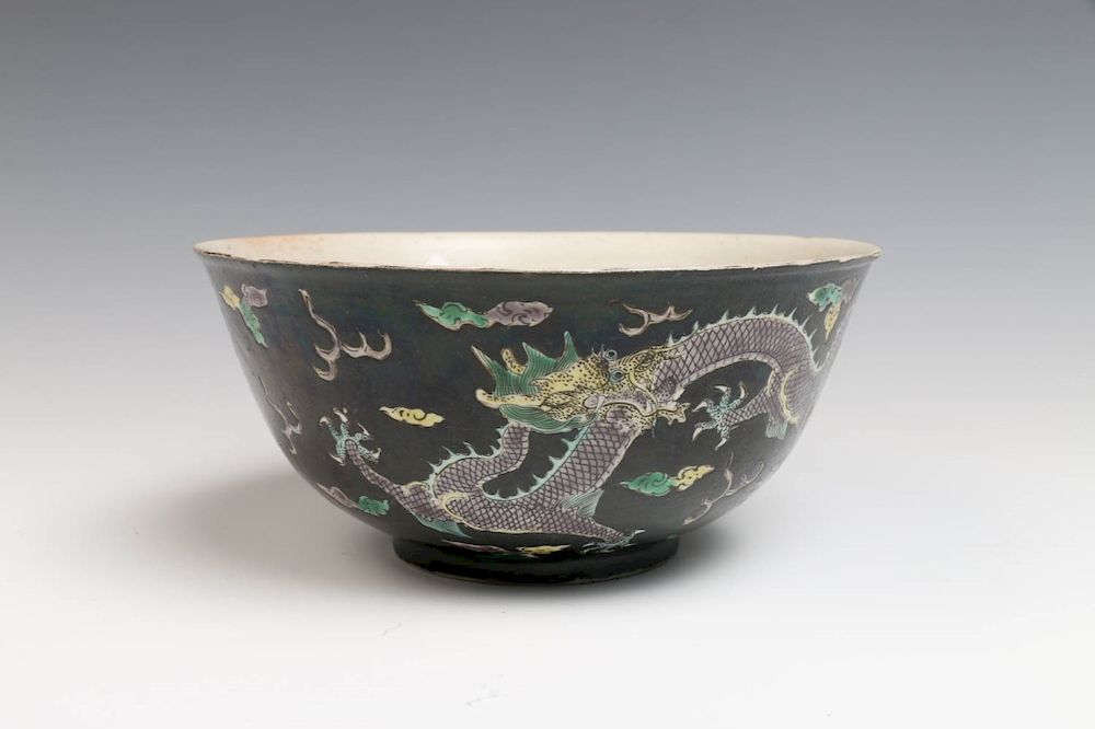 Appraisal: BLACK GROUND DRAGON BOWL GUANGXU MARK AND PERIOD - Depicting