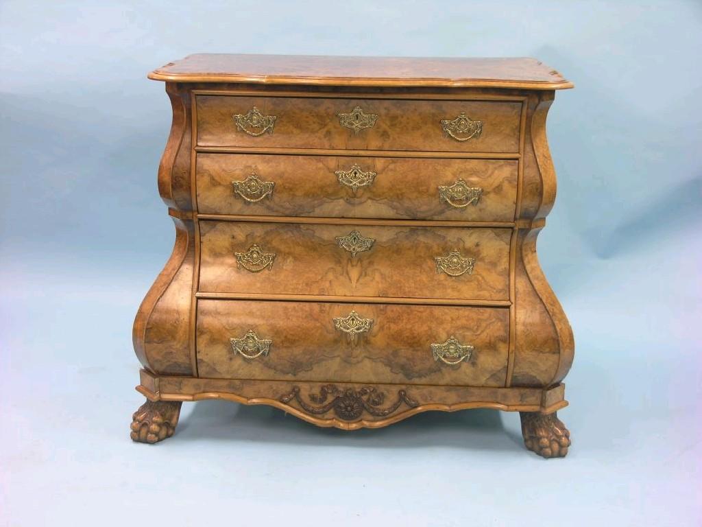 Appraisal: A late th century Dutch burr walnut bombe commode shaped