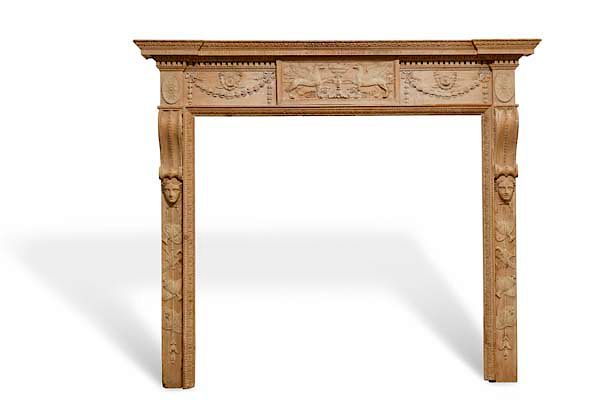 Appraisal: A George III carved pine fire surround A good quality