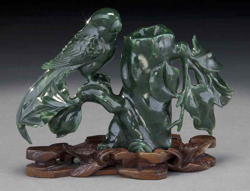 Appraisal: Chinese carved spinach jade brush potdepicting a bird perched on