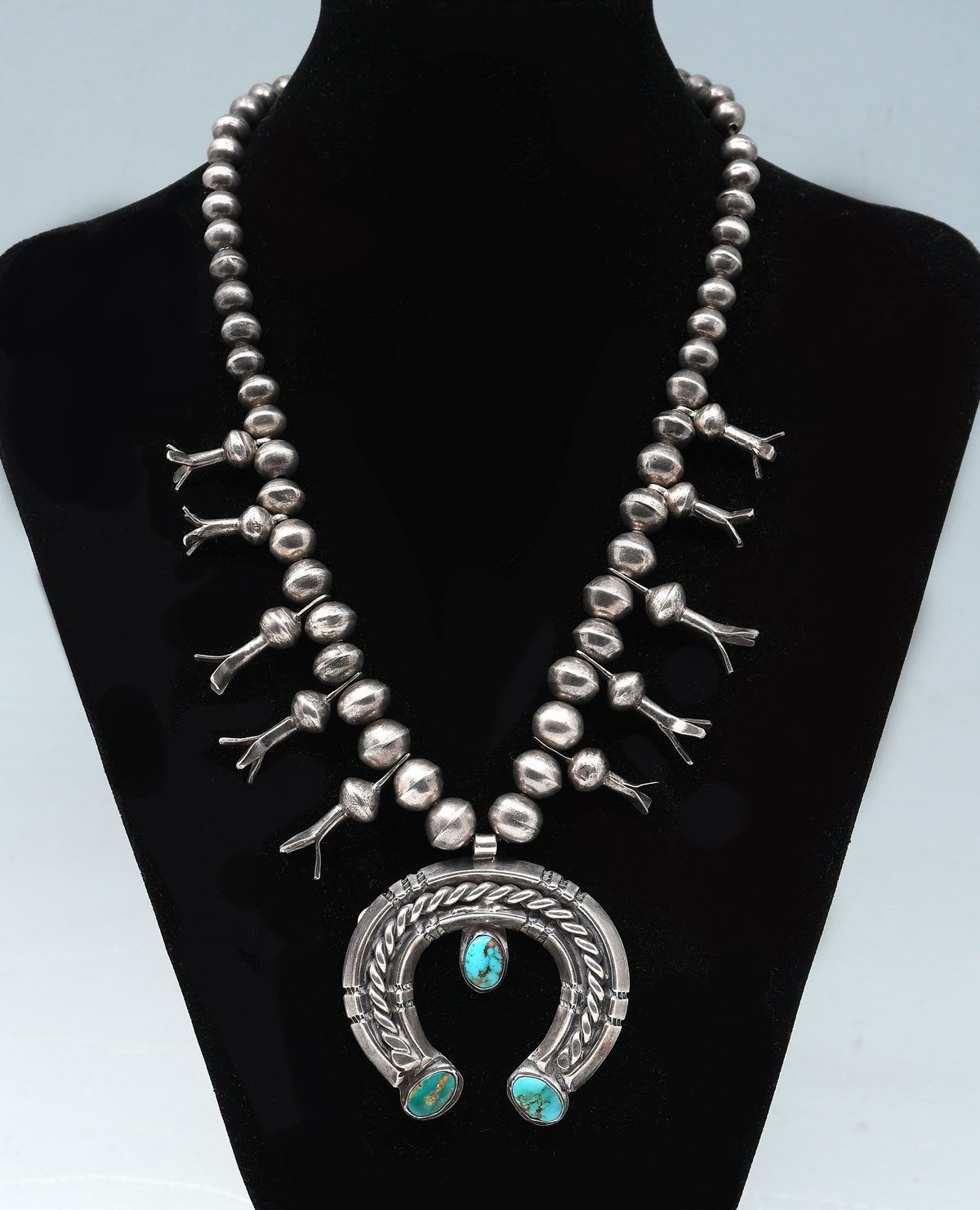 Appraisal: NATIVE AMERICAN INDIAN S SQUASH BLOSSOM NECKLACE drops of turquoise