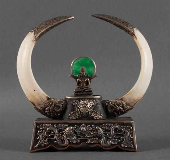 Appraisal: Mixed metal boar's tusk and jade Buddhist shrine pair of