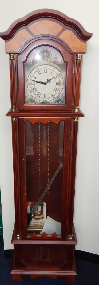 Appraisal: The Trafalgar Grandfather Clock a longcase replica clock paying tribute